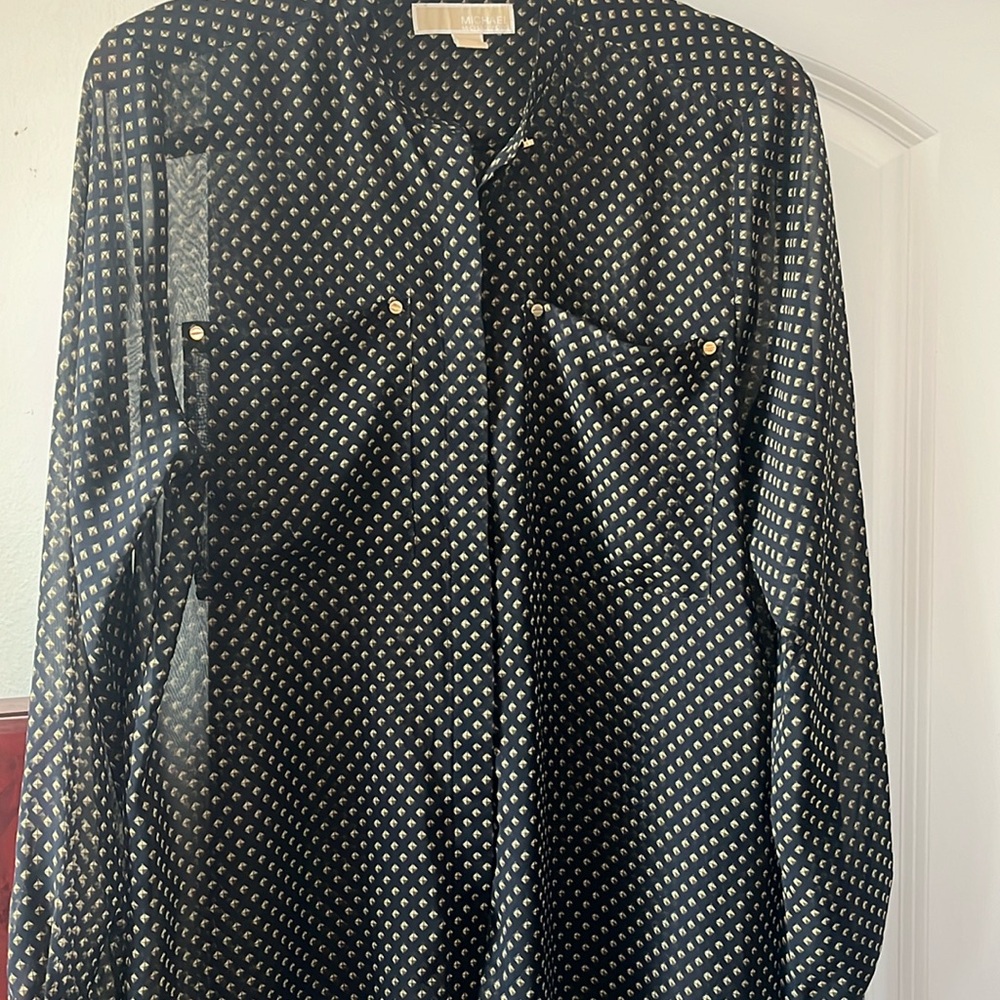 Michael Kors Blue and brown multi colored shirt with gold buttons.